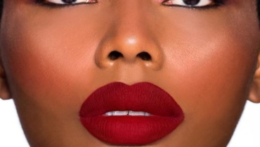 Never underestimate the power of a Powder Kiss red lip