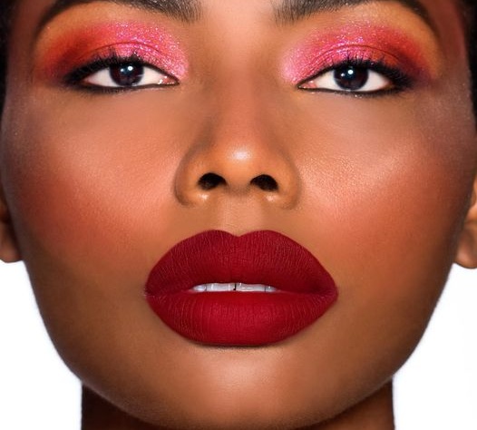 Never underestimate the power of a Powder Kiss red lip