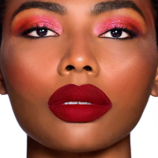 Never underestimate the power of a Powder Kiss red lip